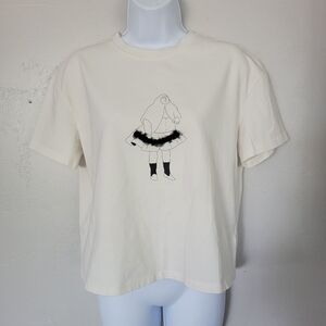 Initial Fashion Ivory Short Sleeve T-shirt Man Wearing Black Tulle Skirt Funky